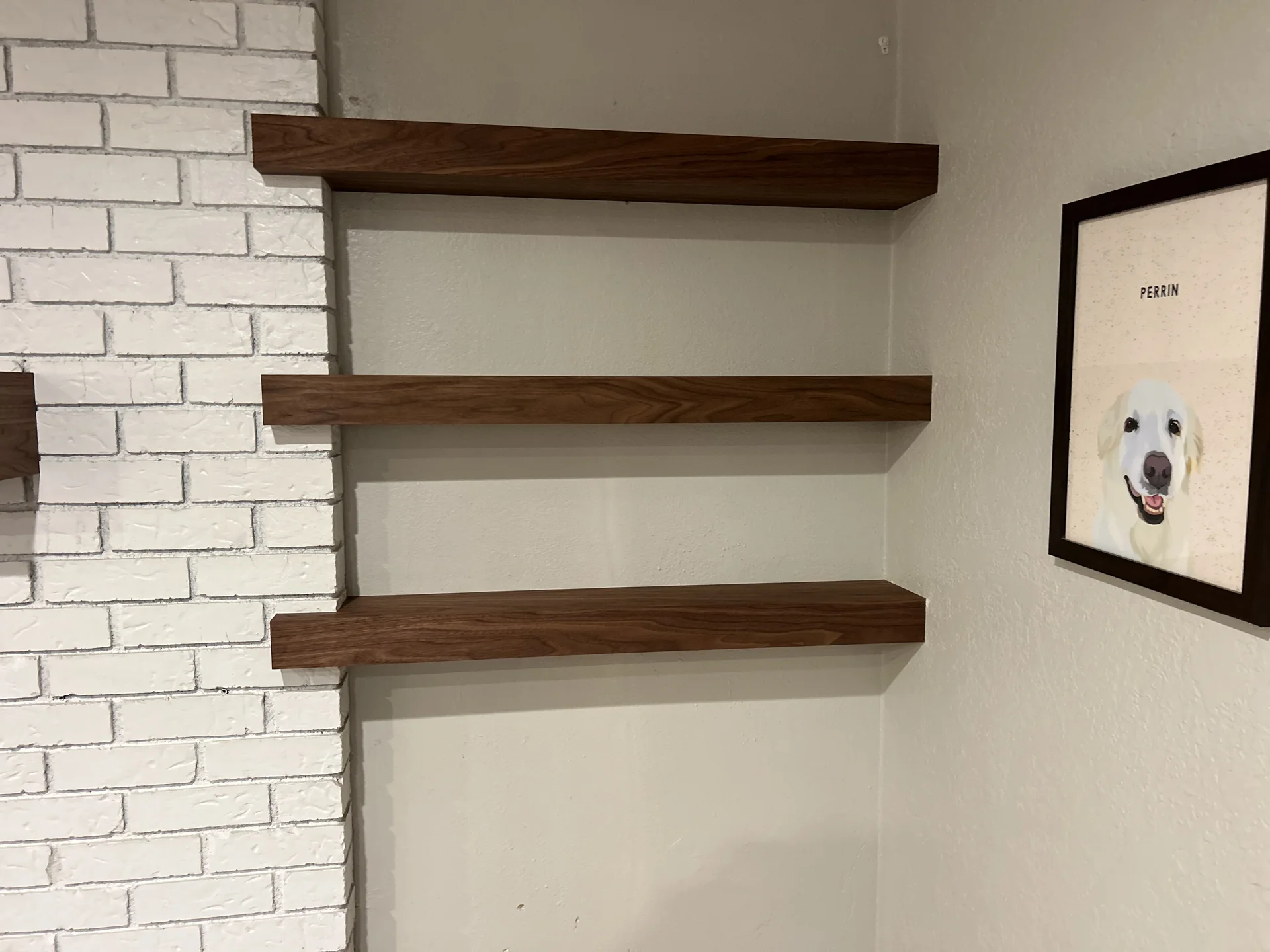 Completed kitchen remodel with green cabinets and white countertops