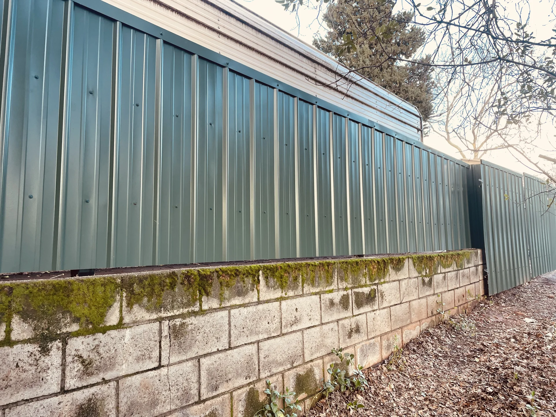 Completed privacy fence installation by Bowman Built in Redding CA