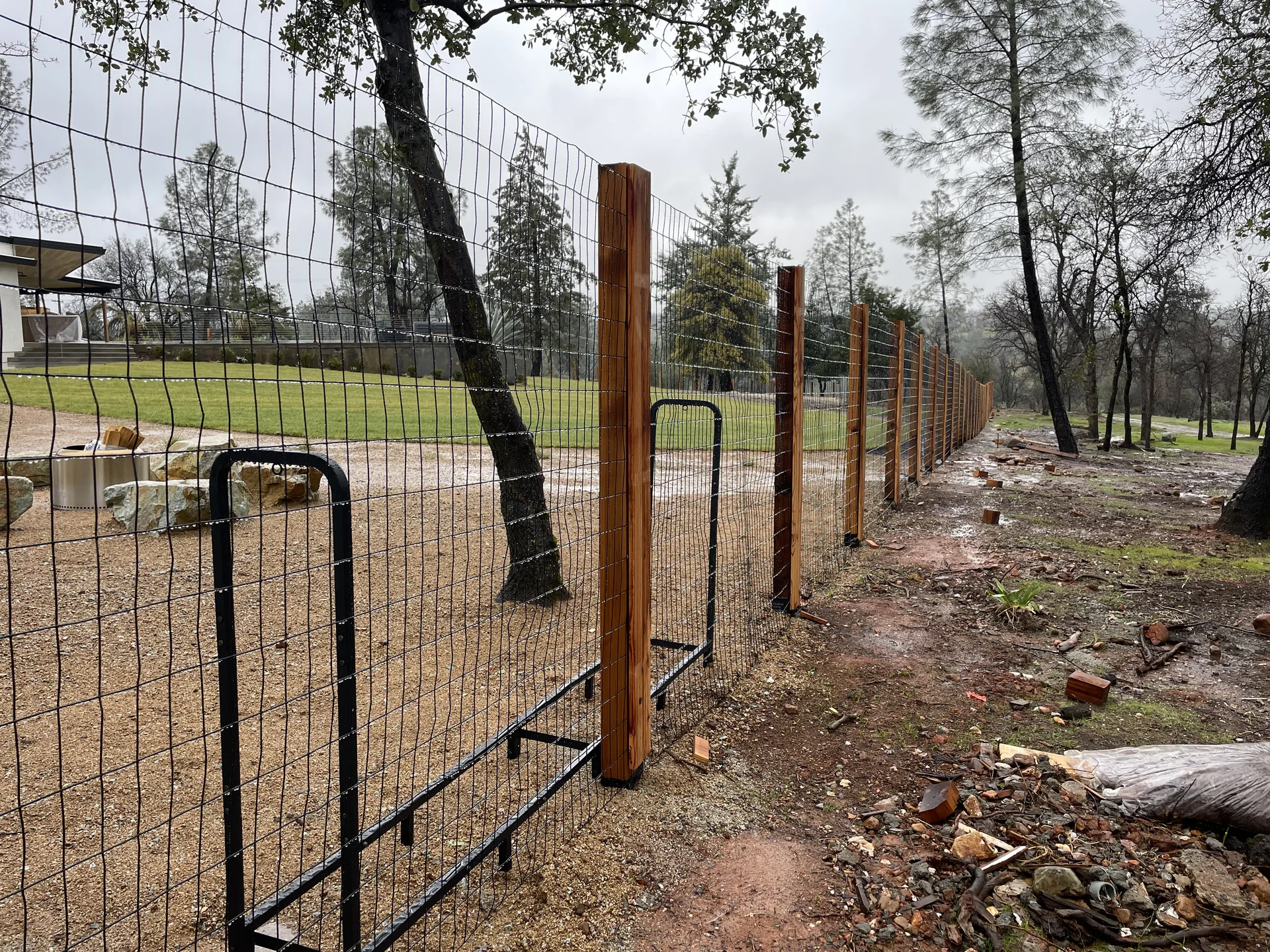 Horizontal fence with gate by Bowman Built fence contractor Redding CA